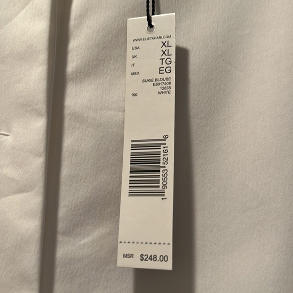 Ellie Tahari tunic blouse with flowy sleeves and an inverted pleat. High-low. - Picture 4 of 7